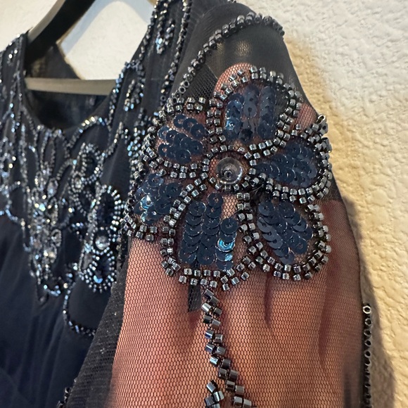 Elegant Navy Evening Gown with Beautiful Beaded Neckline and Flutter Sleeves - Picture 5 of 7